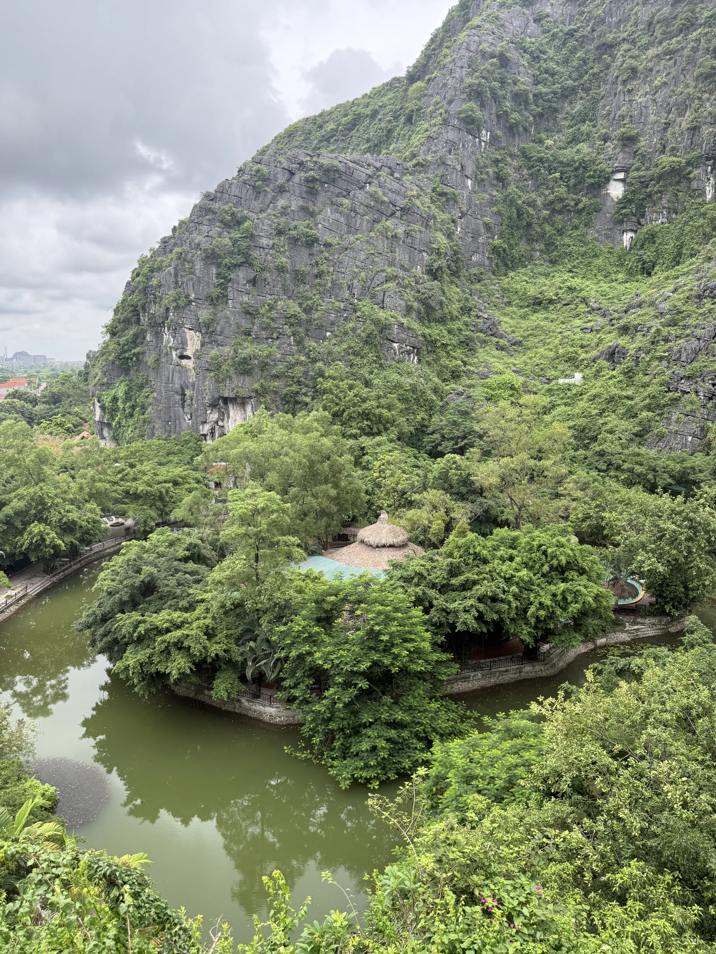 Limestone karsts rising from still water in northern Vietnam