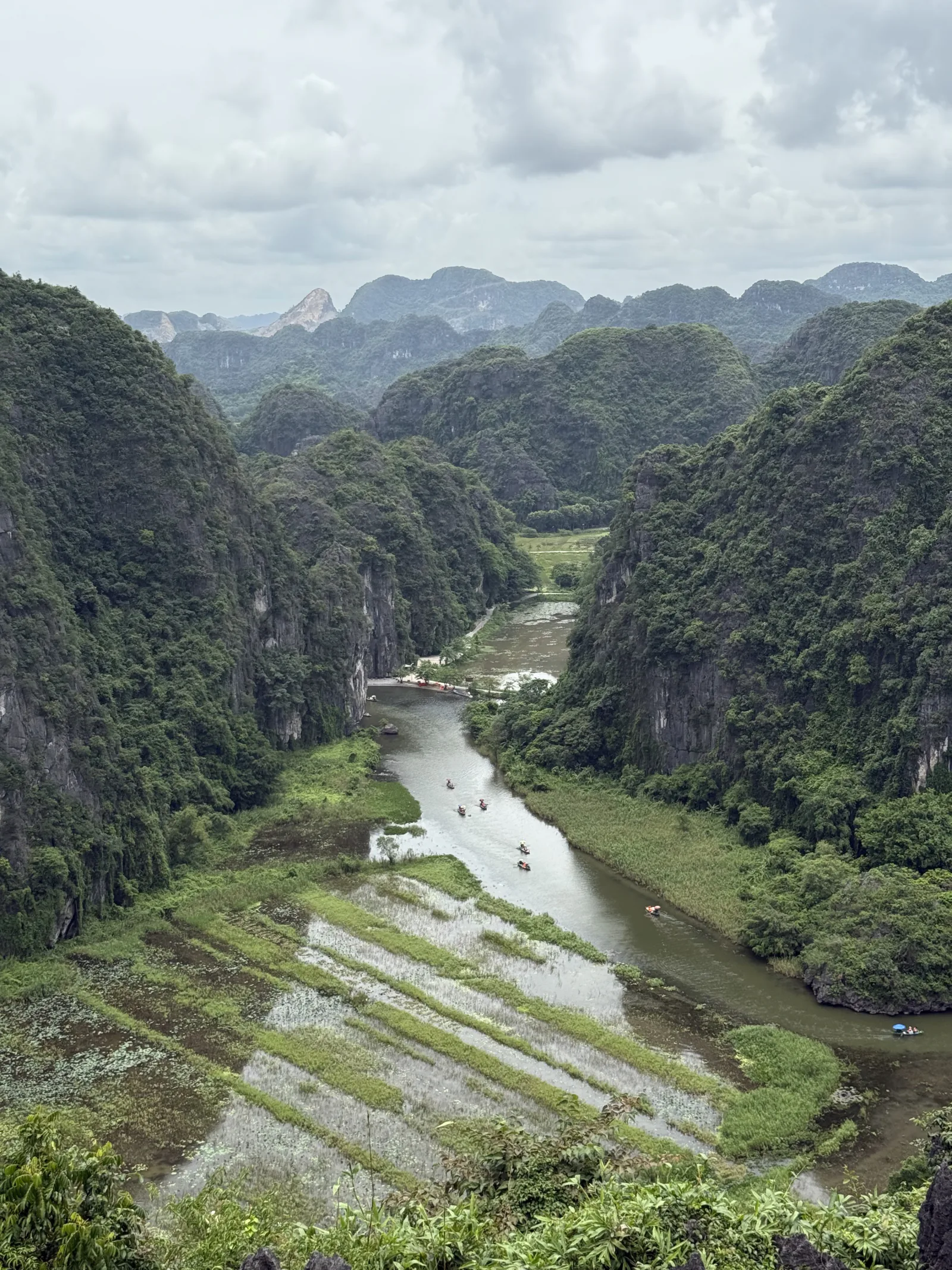 Trang An river gorge through limestone karsts, Northern Vietnam