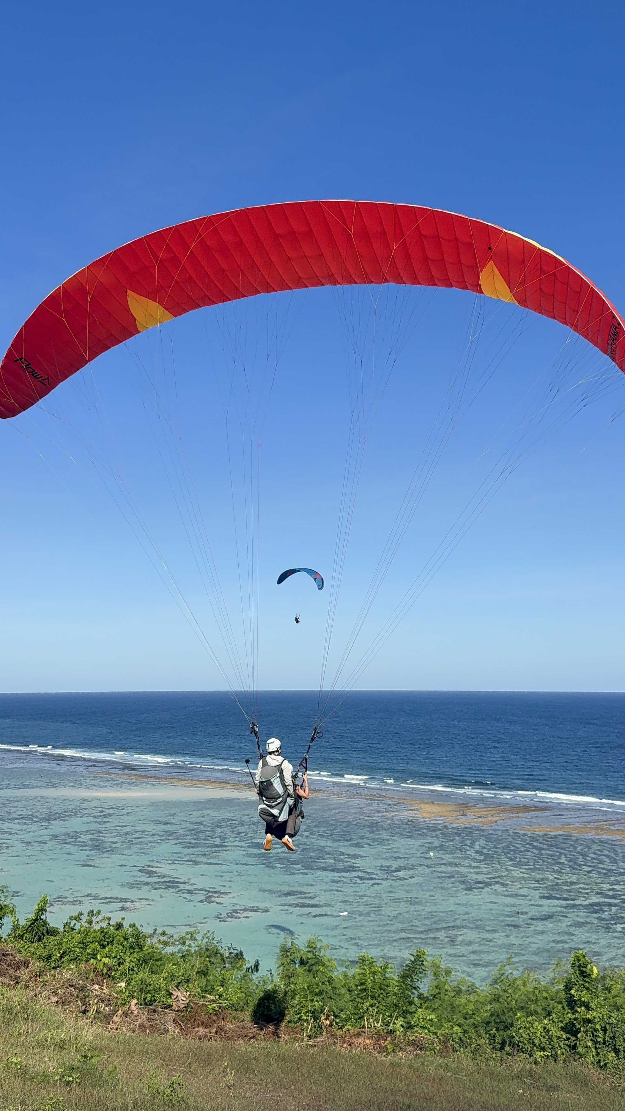 Paragliding and sea kayaking, Bali