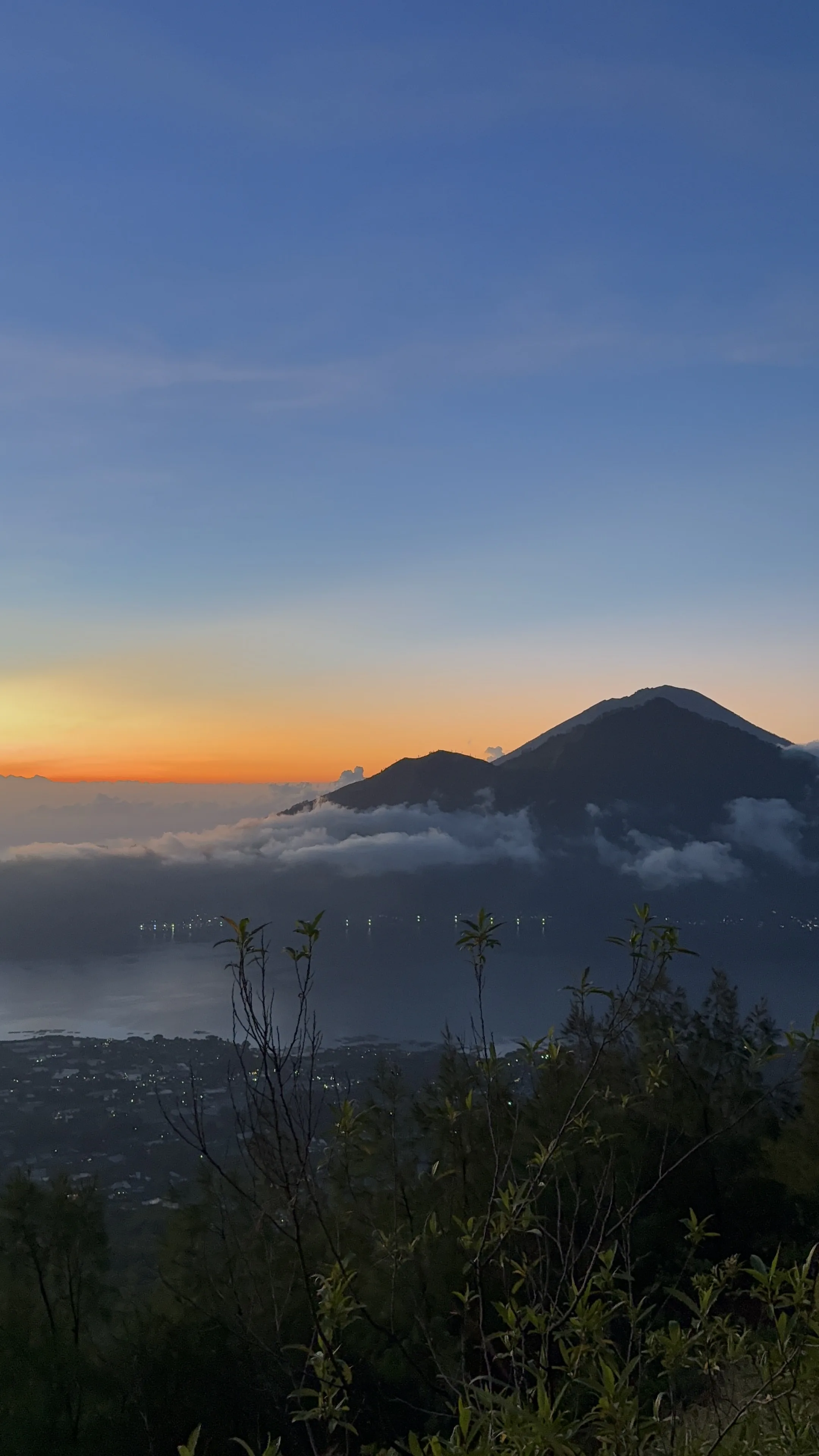 Mount Batur pre-dawn sunrise above the clouds, Bali