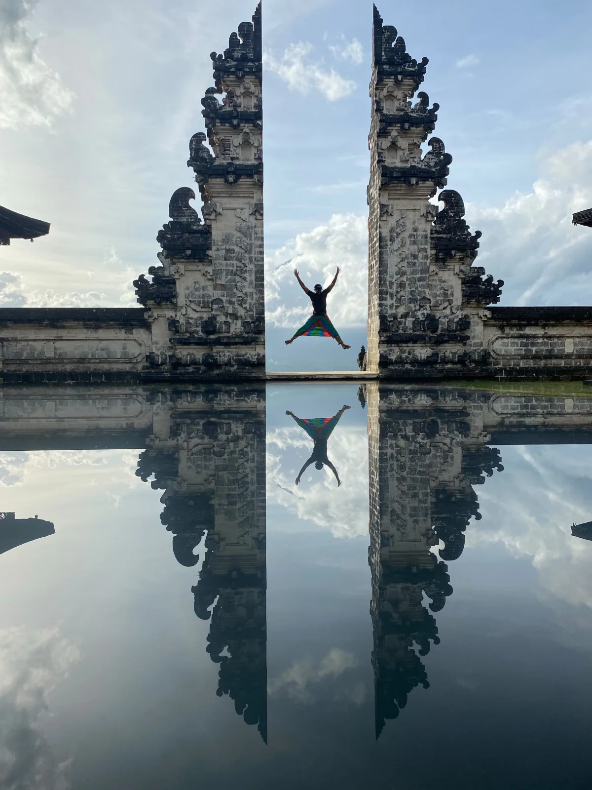 The split gates of Pura Lempuyang mirrored in still water, Bali