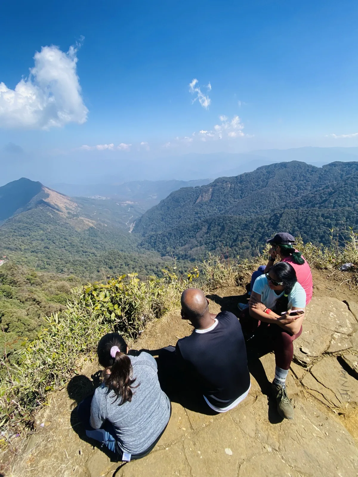 Trekkers resting on a ridge in Nagaland